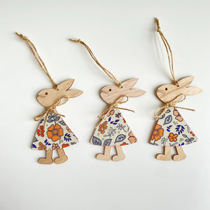 Wooden bunny hanging decoration with fabric dress